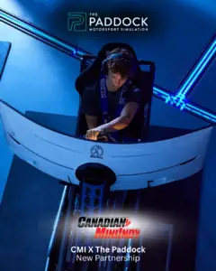 Paddock 4 Elementor Hosted Website Elementor Hosted Website Person seated in a blue racing simulator cockpit wearing a headset, logo of The Paddock above, caption announces Canadian Minindy partnership with The Paddock.